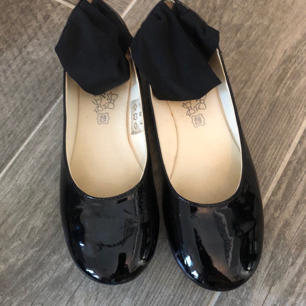 Black patent leather ankle tie shoe